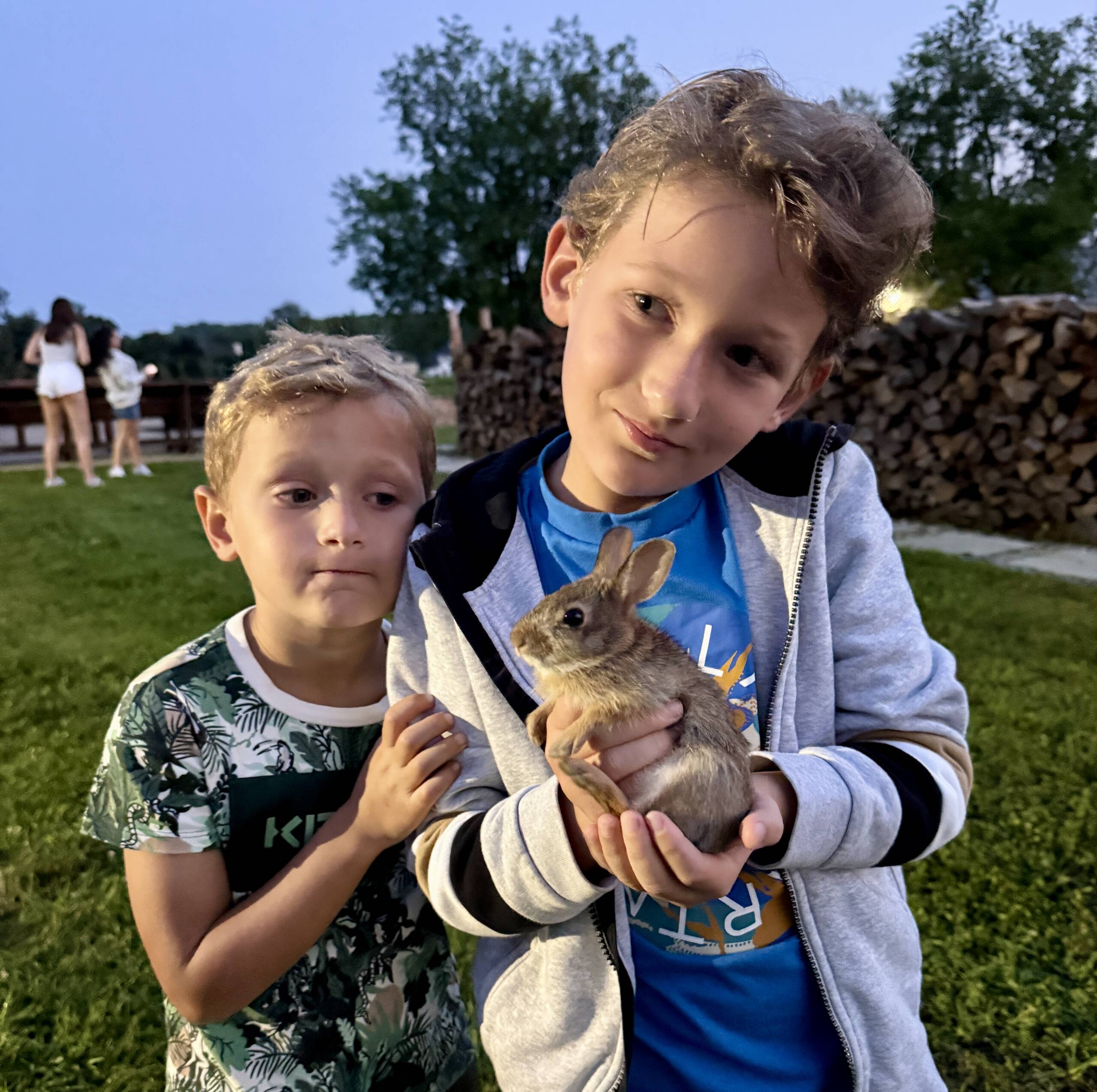 Jacob and Matthew holding a bunny at Marlboro Meadows Farm